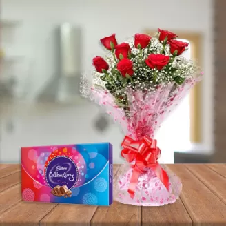 7 Red Roses with Free Celebration Pack